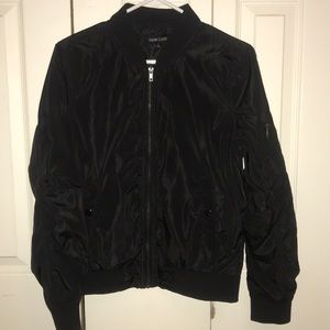 Black windbreaker